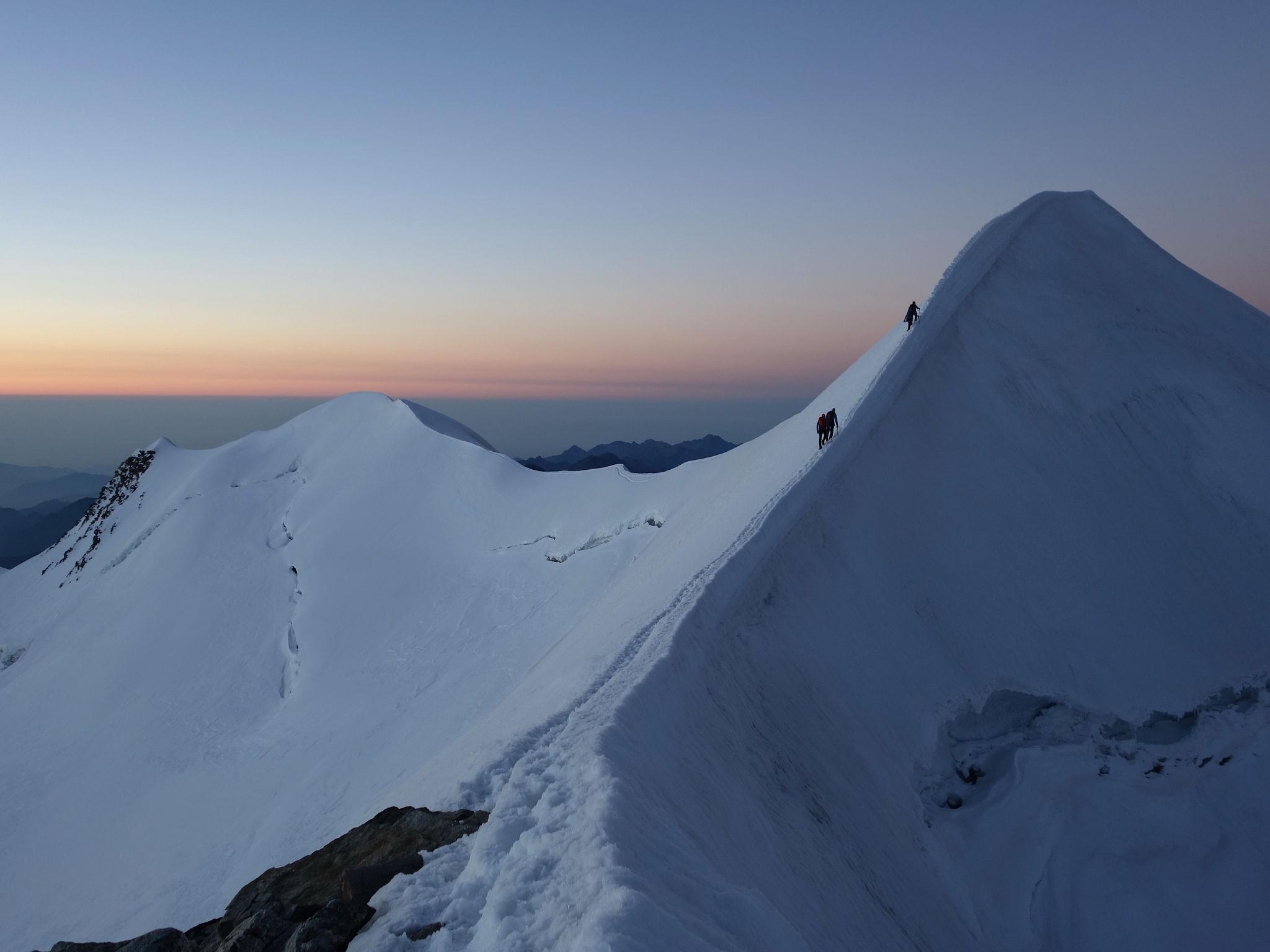snowcapped mountain at sunset